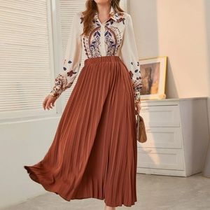 Floral blouse and pleated skirt